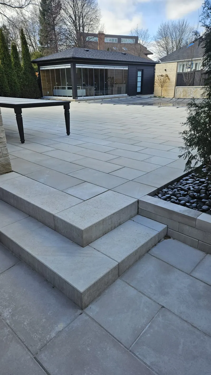 Large-format slab steps and landing beside a gazebo